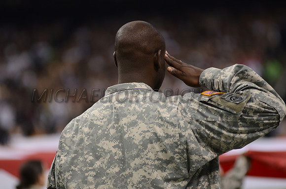 Military salute during national anthem