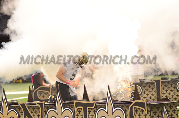 Drew Brees of the New Orleans Saints comes out of fog
